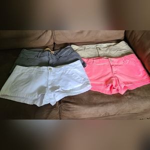 Bundle Hollister Shorts 4 pairs, white, grey, pink, and khaki. Size 5